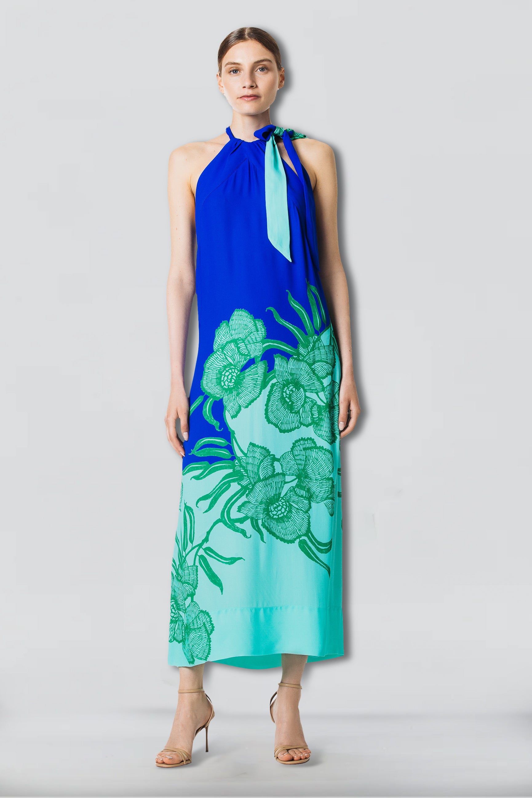 Feestelijke jurk in luchtige viscose met haltersluiting en levendige kleuren mint groen en Kleinblau